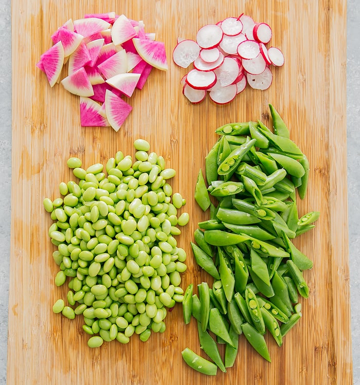top-down photo of ingredients for the salad on a cutting board
