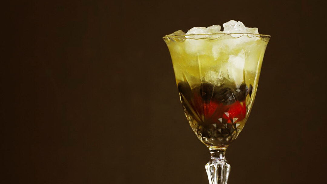 cocktail in a dark red background