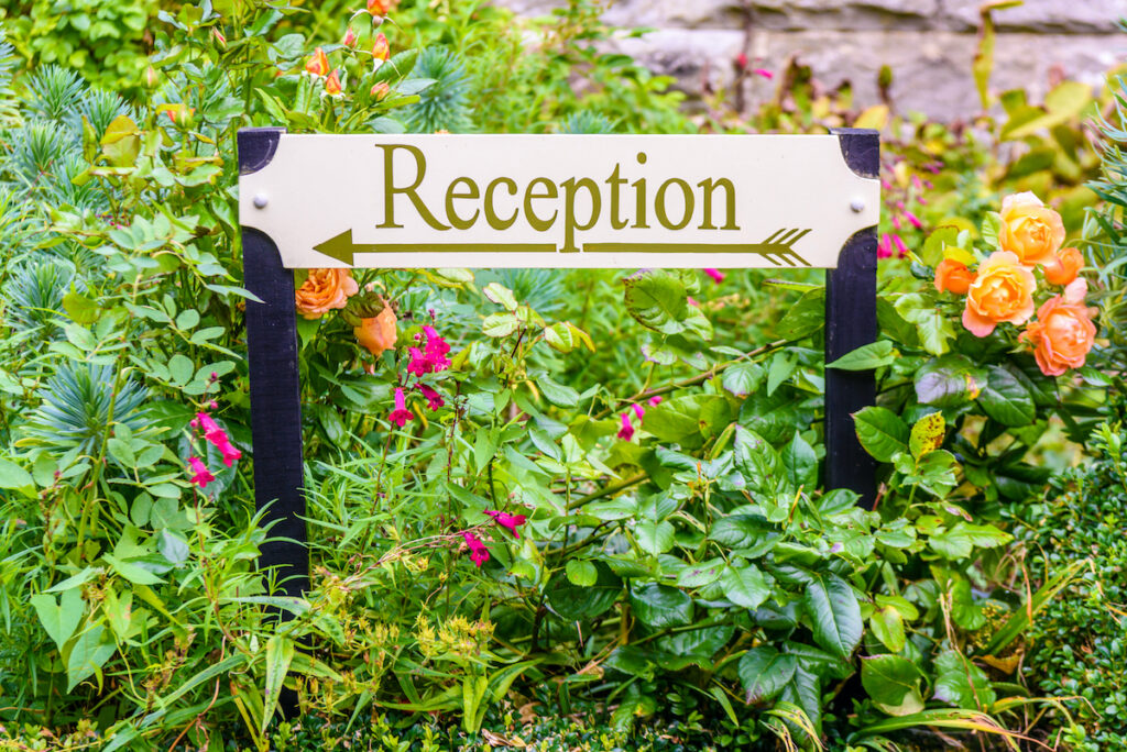 Reception sign in garden