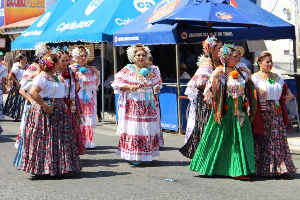 Women in traditional dress at the Polleras Parade.