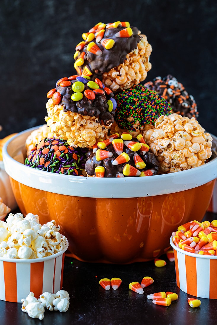 chocolate covered popcorn balls in a bowl