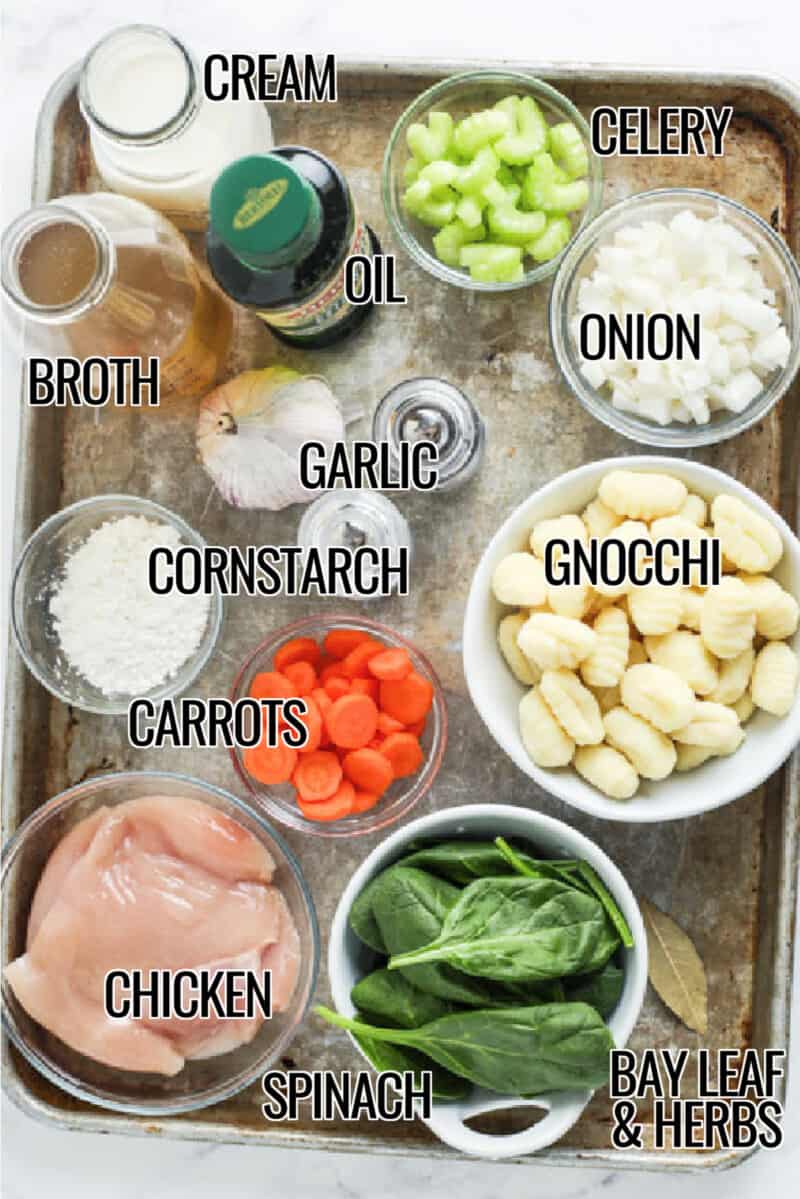 ingredients for chicken gnocchi soup on a pan