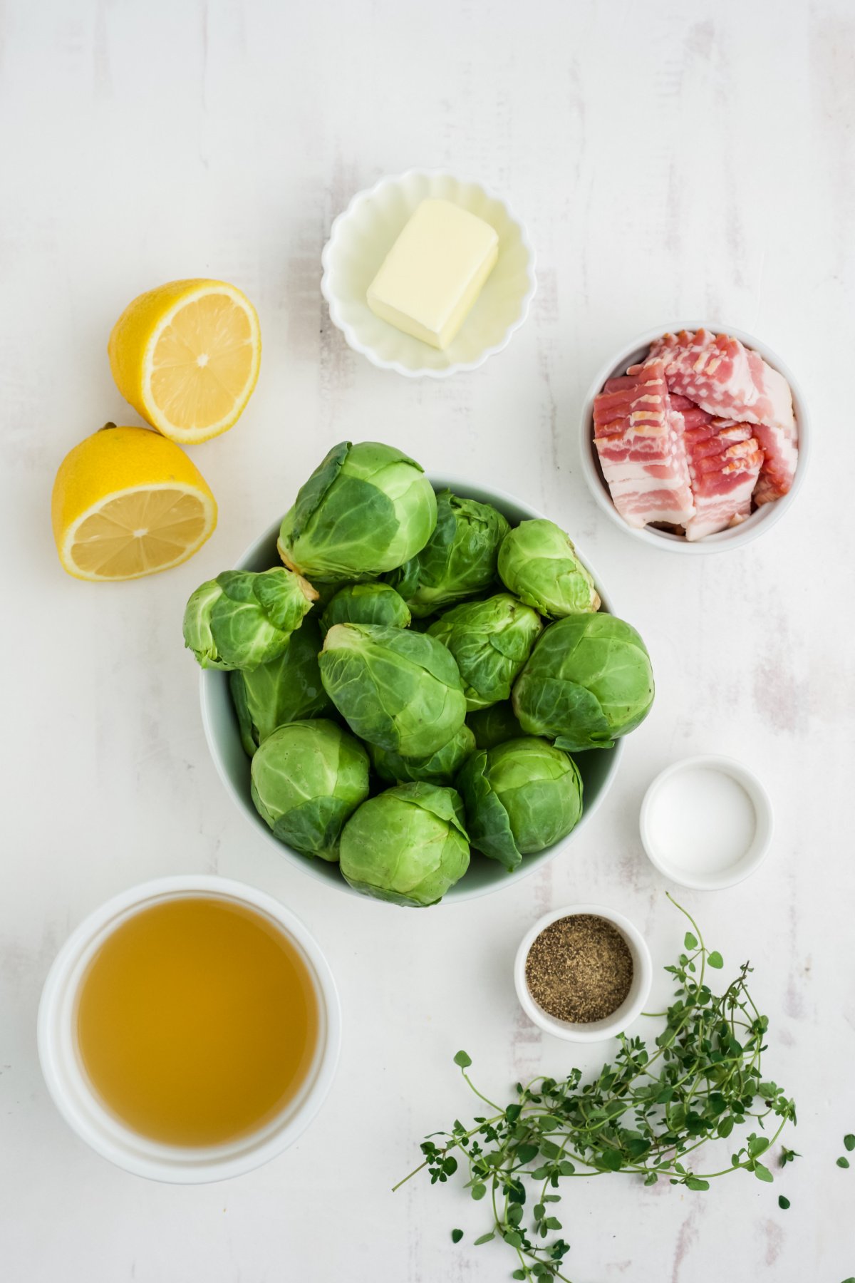 Ingredients to make crockpot Brussels sprouts on the table before preparing.