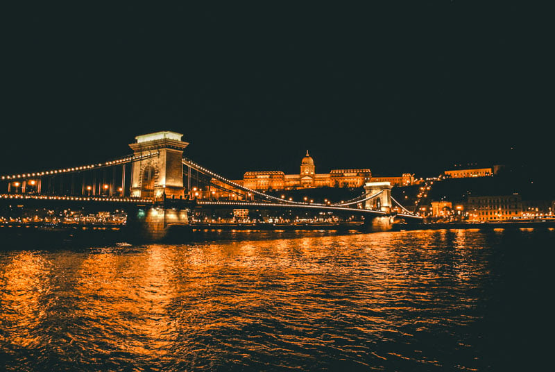 Experience a starlit skyline with 'Legenda' boats, showcasing iconic landmarks on Budapest Night Cruises.