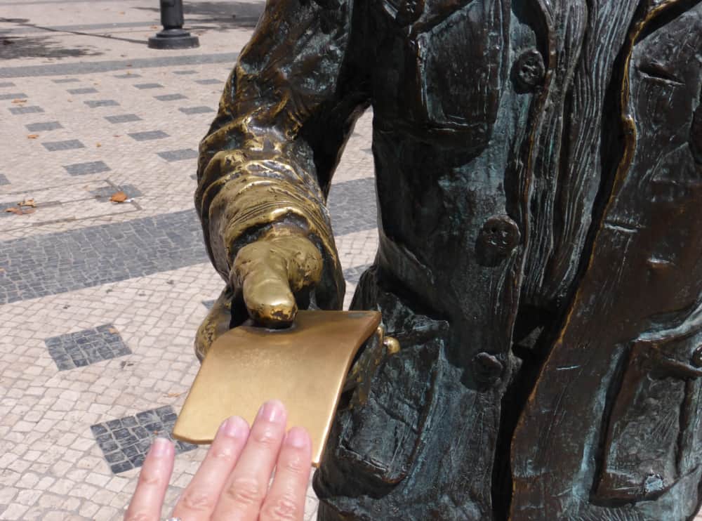 Lisbon Ticket Vendor Statue