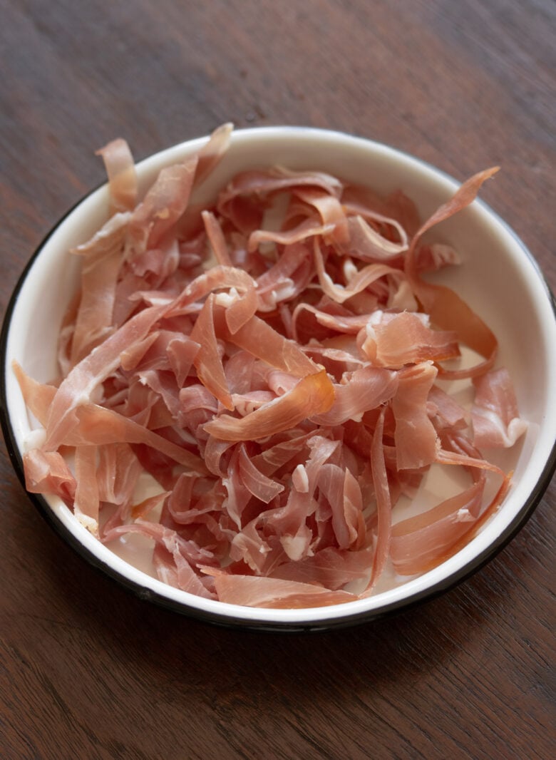 sliced prosciutto  and egg whisked with heavy cream