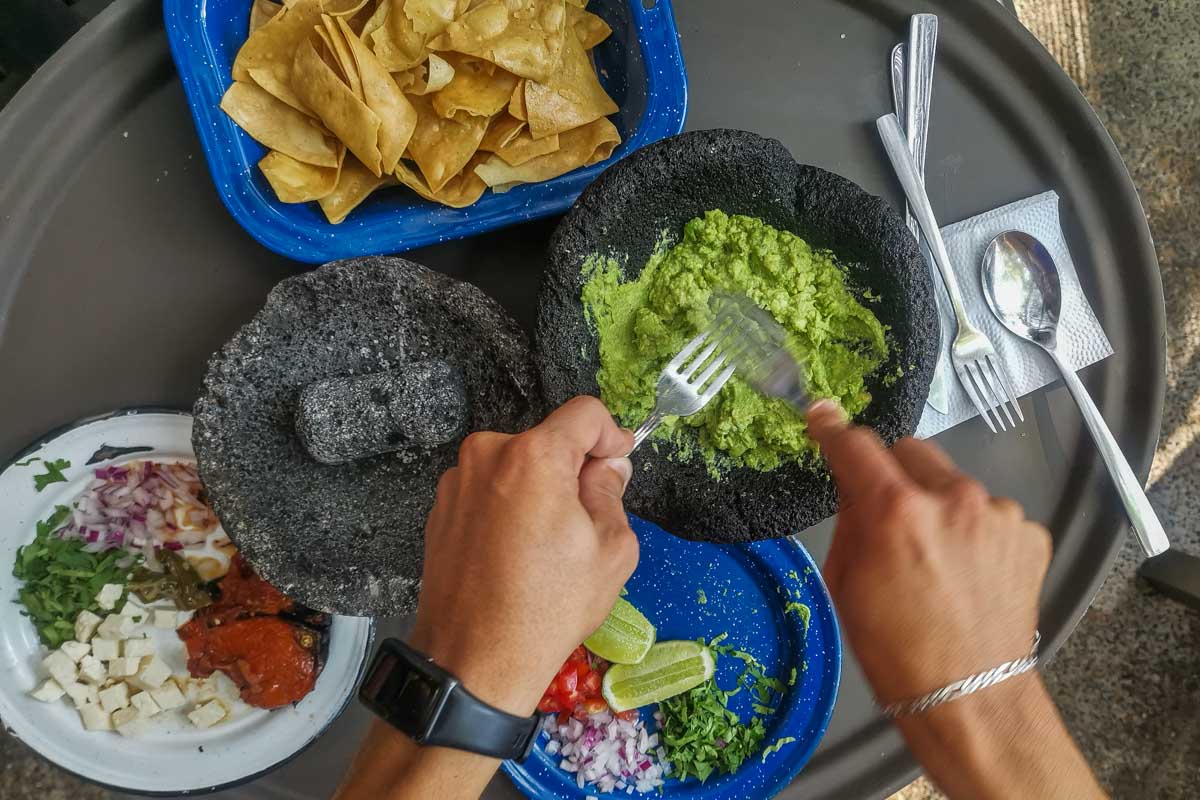 Making Guacamole on a cooking class in Mexico
